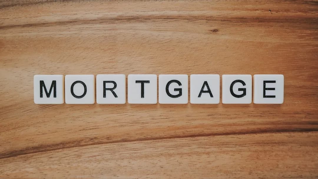 Mortgage letter tiles on a timber surface