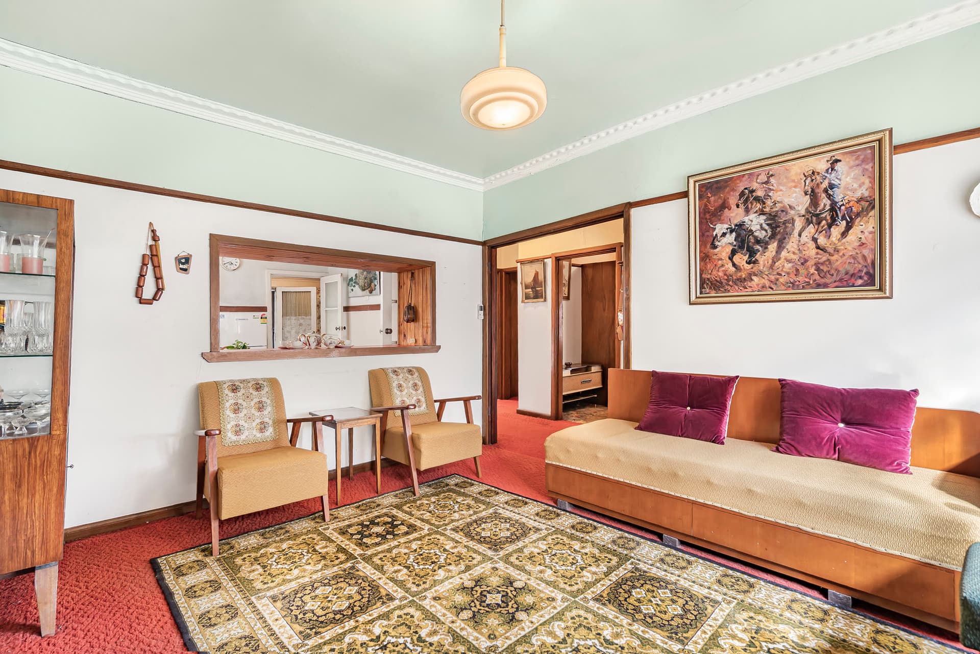 A lovingly kept original living room in a Mordialloc home